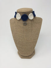 Load image into Gallery viewer, Blue and ivory hand-knitted pet collar with star of David star around a tan brown bust