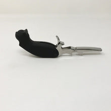 Load image into Gallery viewer, Picture of a black cat-themed bottle opener that is fully extended, laying flat on a white surface
